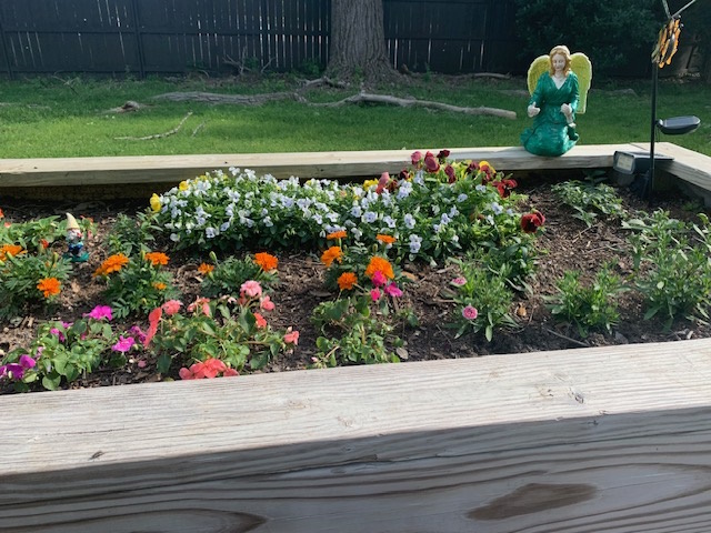 planter box with blooming spring flowers