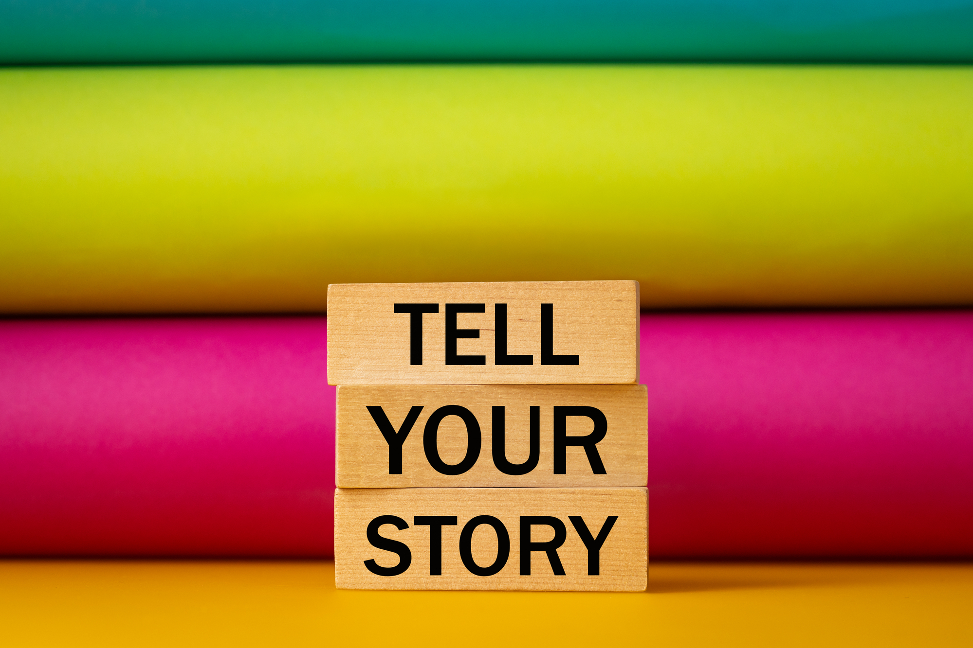 colorful background with Tell Your Story